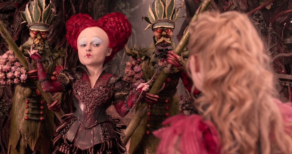 Alice (Mia Wasikowska) returns to the whimsical world of Underland and encounters Iracebeth, the Red Queen (Helena Bonham Carter) in Disney's ALICE THROUGH THE LOOKING GLASS, an all-new adventure featuring the unforgettable characters from Lewis Carroll's beloved stories.